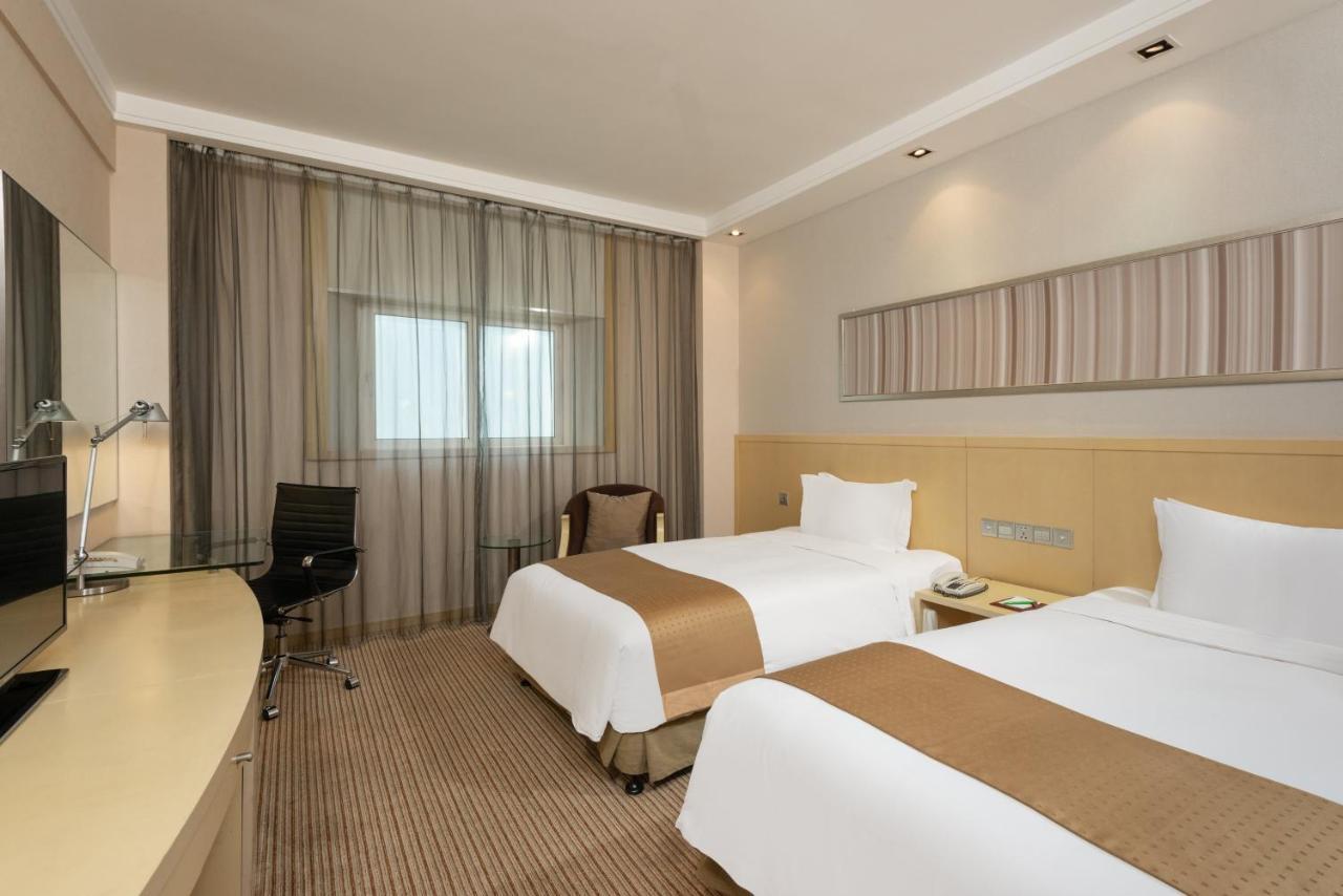 Holiday Inn Downtown Shanghai Rum bild